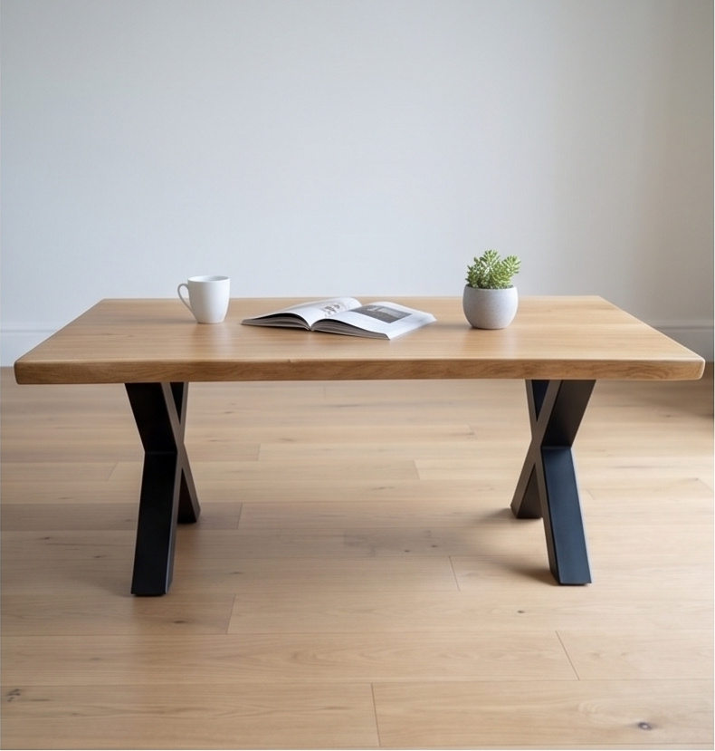A Timber Row French oak coffee table seen head-on, showing both black steel X legs