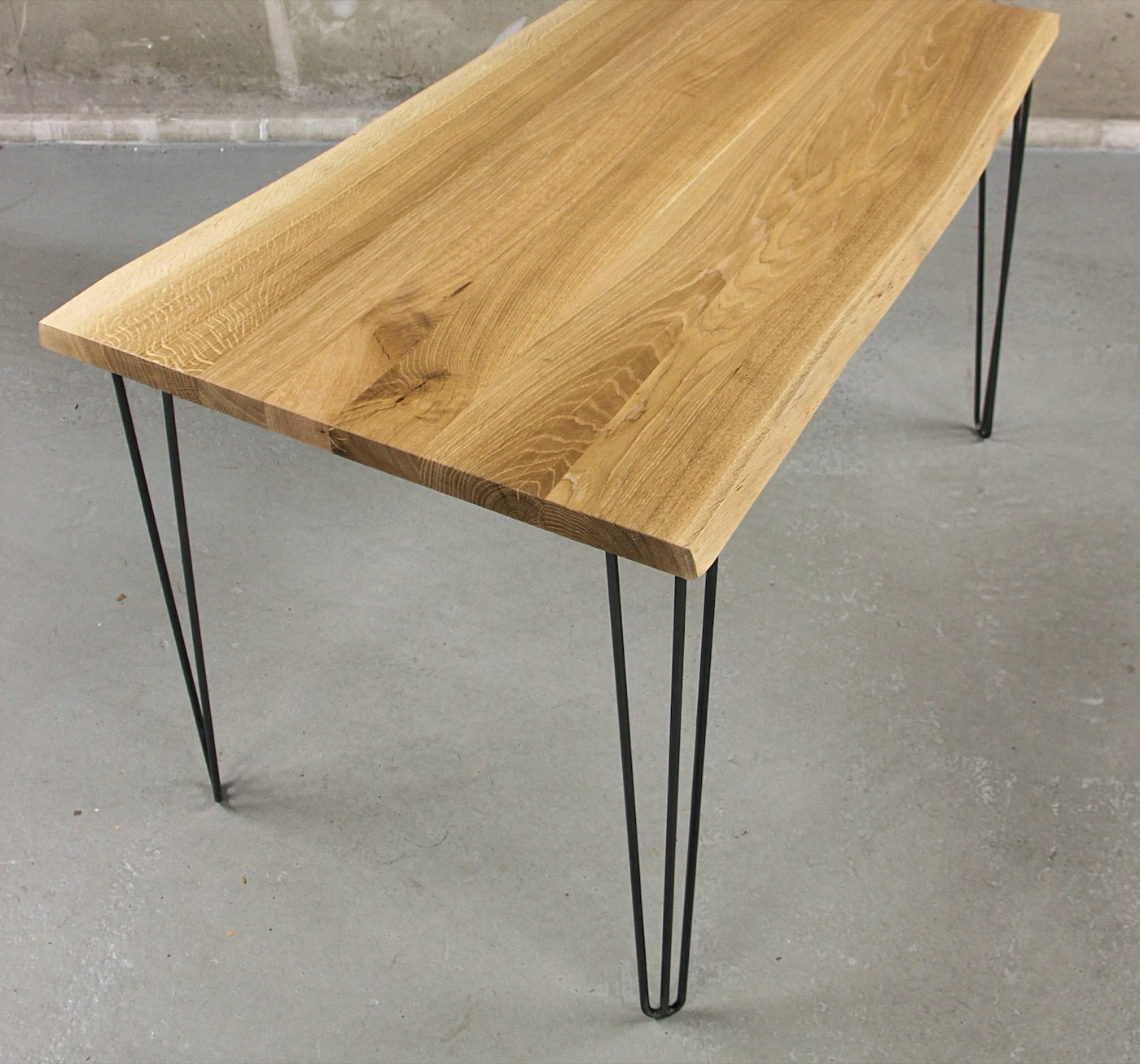 The metal Hairpin-leg range, slim three-rod steel on solid French oak